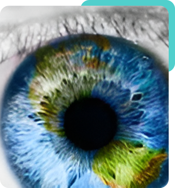 A close up of the eye with blue and green colors.